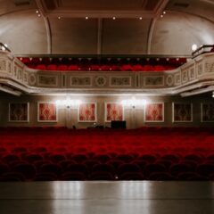 Empty concert hall red seating