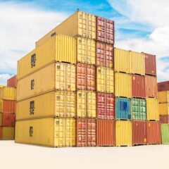 Five rows of yellow, brown, and blue shipping containers